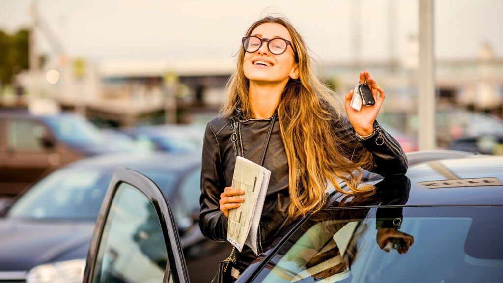 a white woman renting a car while traveling solo in thailand